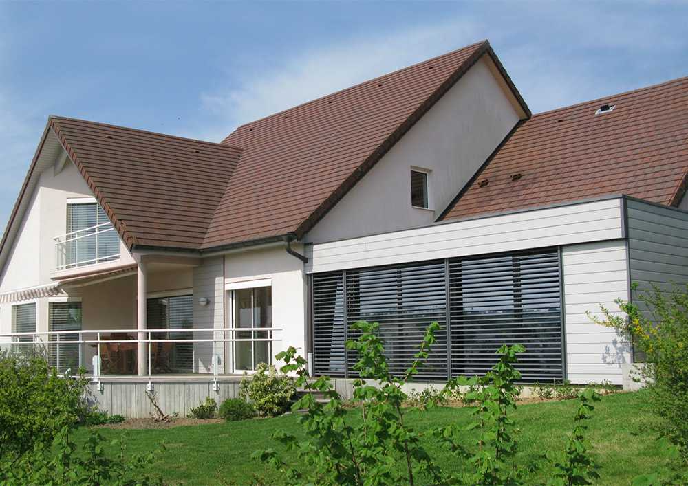 Une maison avec une extension réalisée par Moyse 3D